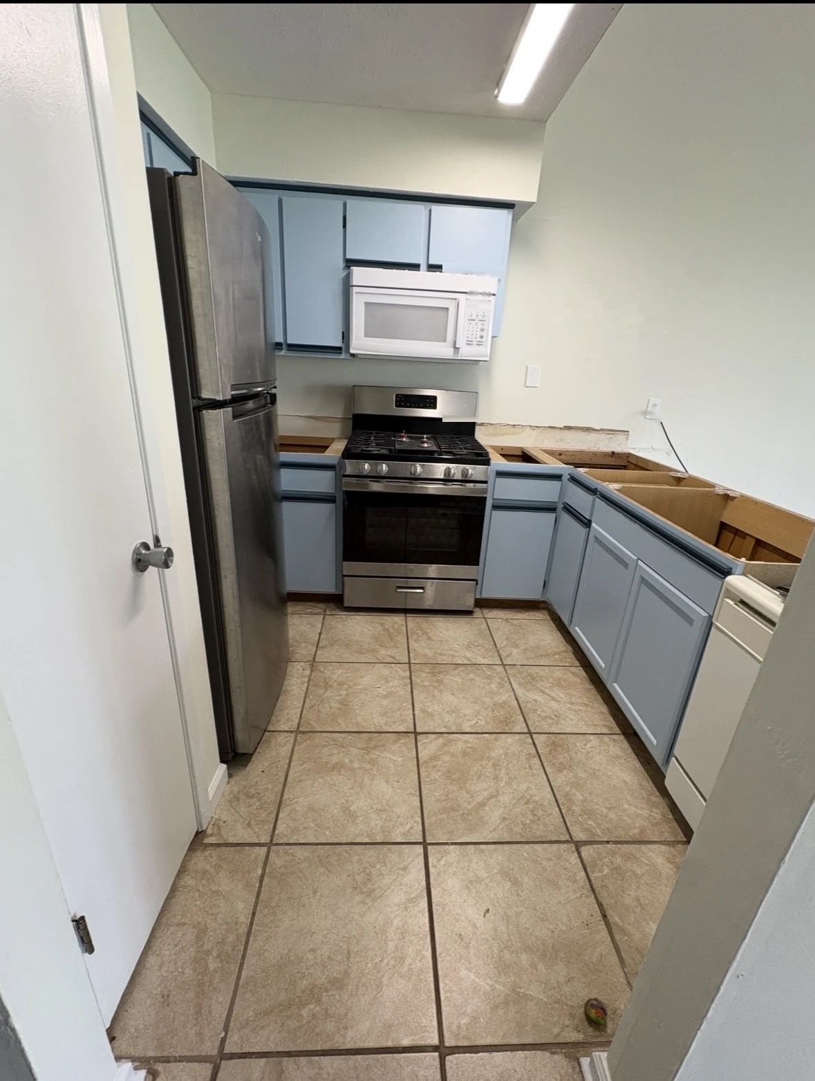 Kitchen cabinet painting project in Niceville FL by Scorpion Paint