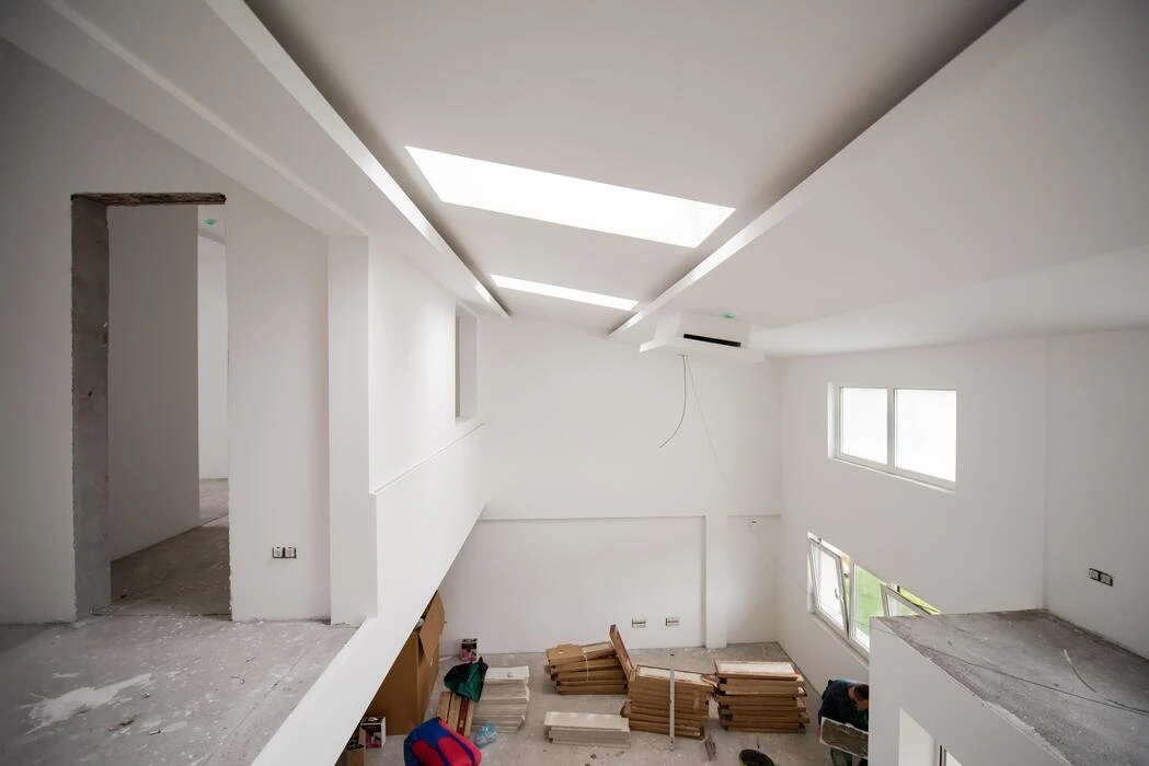 Interior construction site with white drywall ready for painting